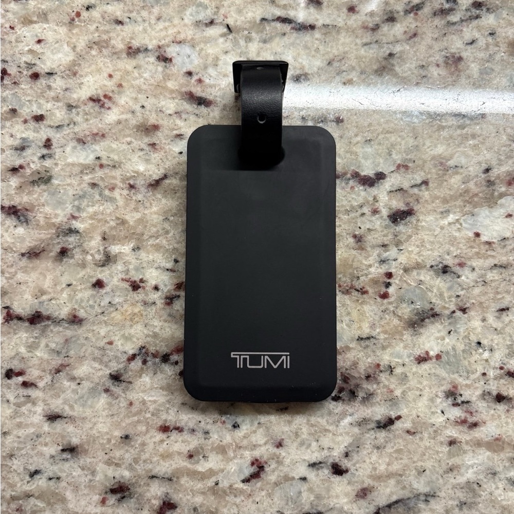 TUMI Apple Charger Bank Luggage Tag